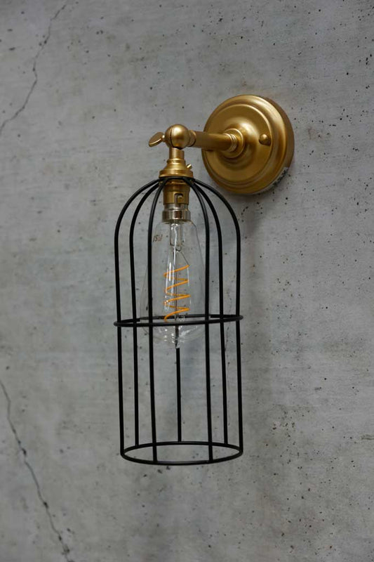 Long cage shade in black with gold/brass sconce