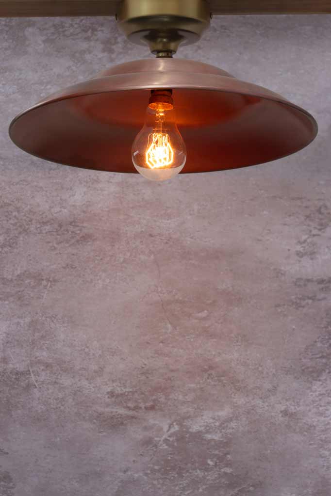 Barn Close To Ceiling Light with copper shade and gold/brass batten holder.