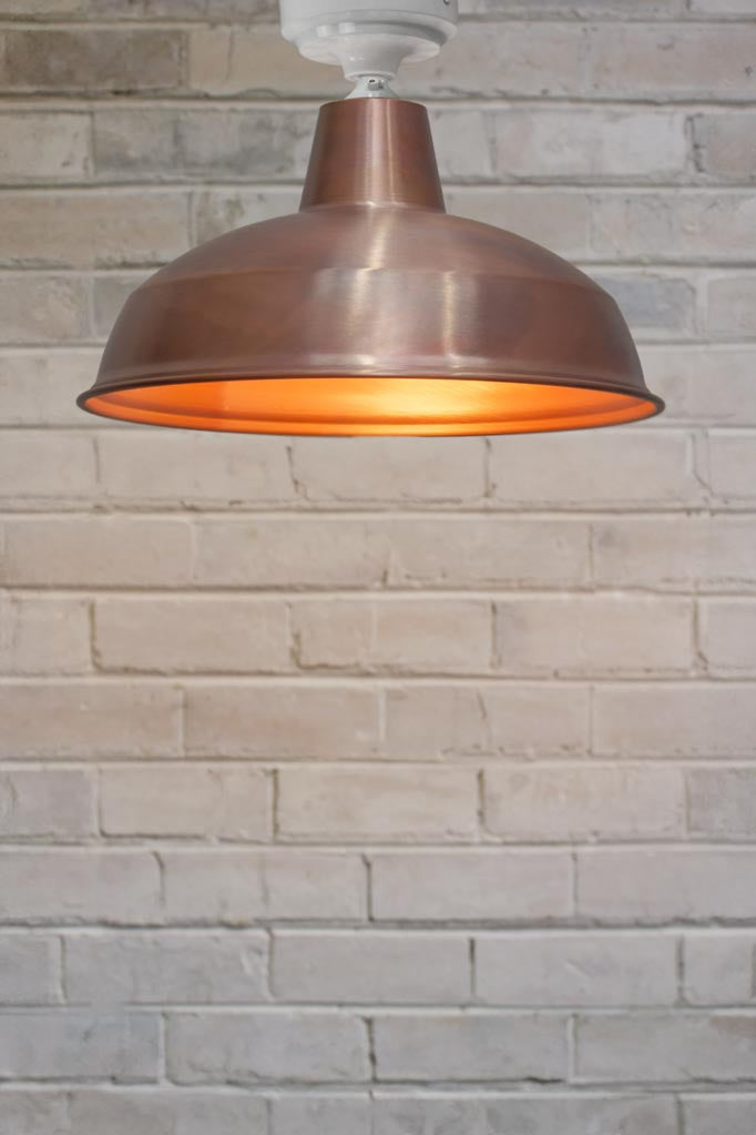 Small close to ceiling warehouse shade in copper with white batten holder.