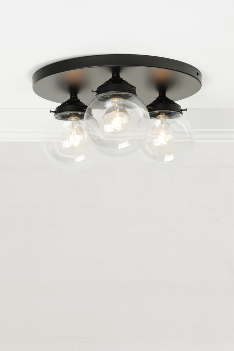 Three light clear shade flush mount