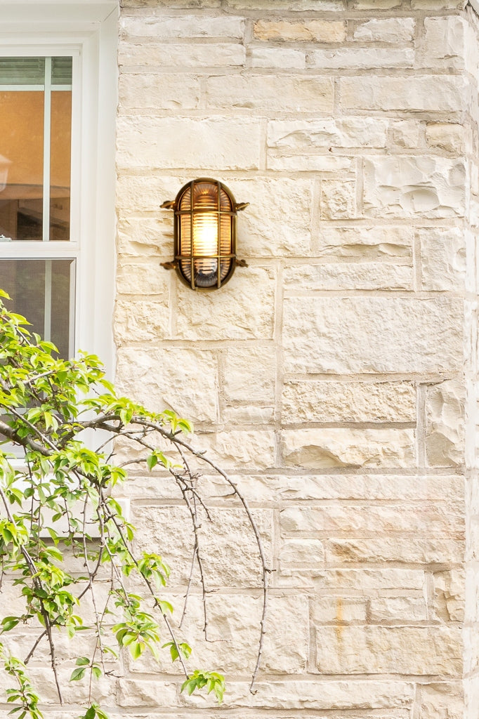 bunker cage light on exterior wall