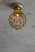 Clear glass ball shade with rope detail on a gold/brass batten holder. 