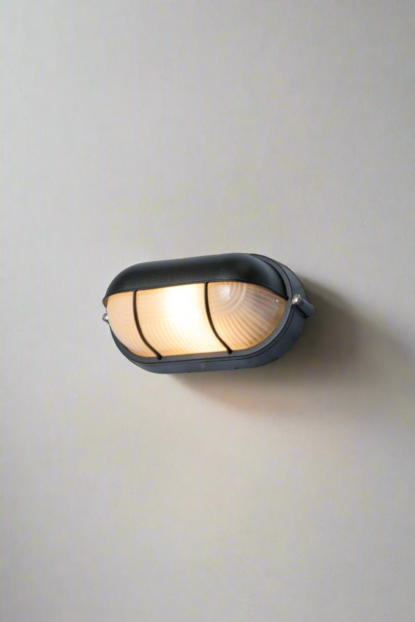 Robe Oval Caged Eylid Bunker Light on wall