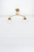 Small clear glass ball ceiling light with triple gold/brass straight arm fixture. 