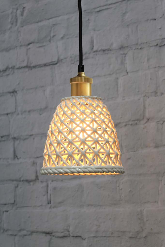 Large ceramic pendant light with gold/brass cord