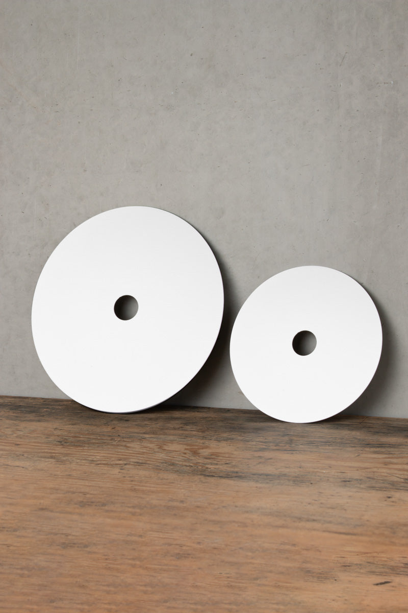 Small and large white discs