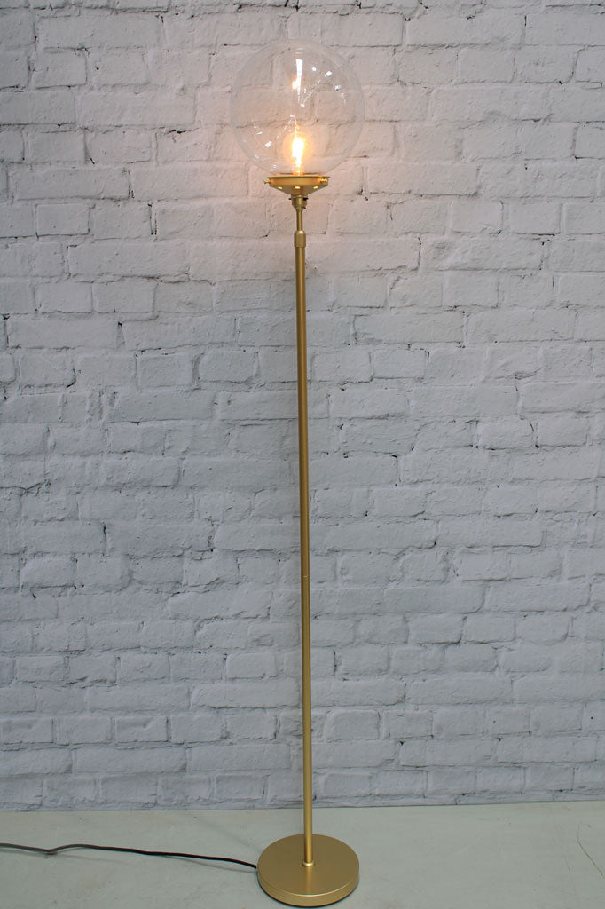 Medium opal glass ball shade on a gold/brass lamp stand