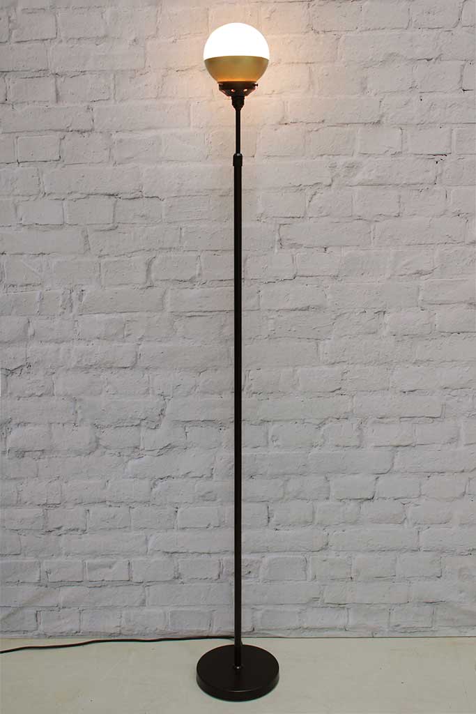 Crown sphere floor lamp with black base, black gallery and gold shade