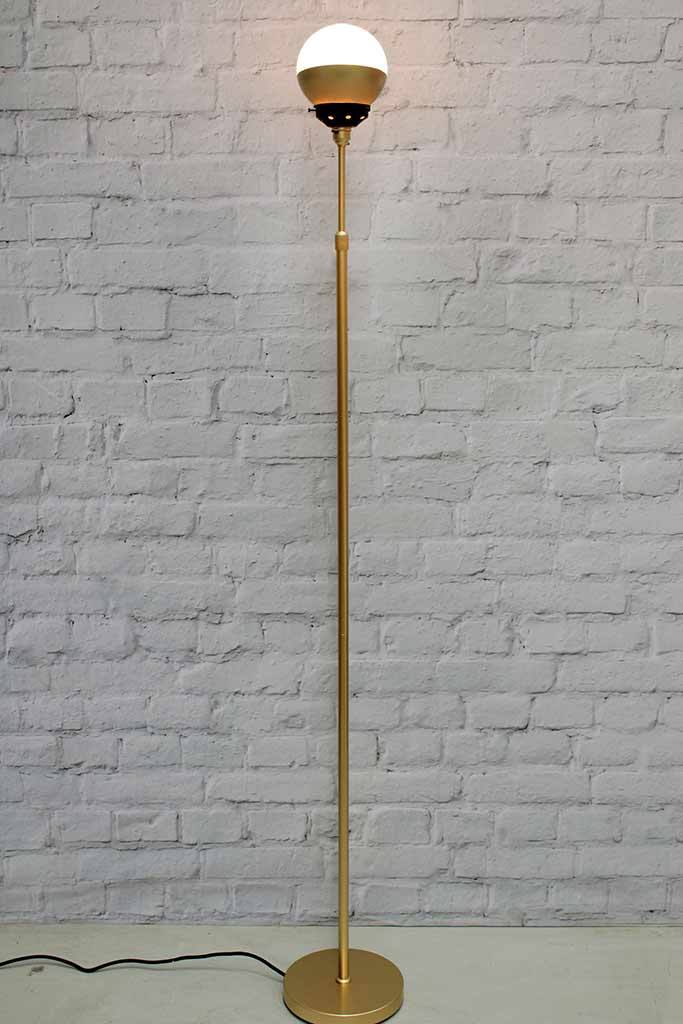 Crown sphere floor lamp with gold base, black gallery and gold shade