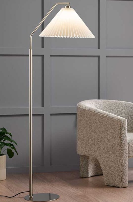 Elegant Bradhurst Floor Lamp standing in an empty room.