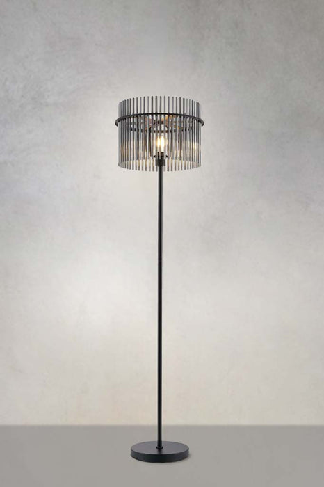 Chrysler floor lamp with a black base and stem with a smoke glass rod shade. 