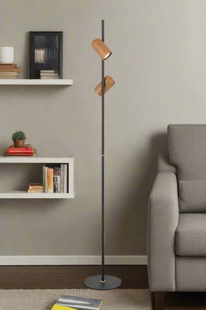 Twin floor lamp in black in a lounge room. 