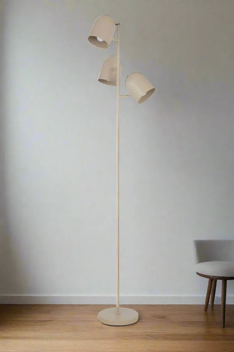 Khaki triple light floor lamp, lights off. 