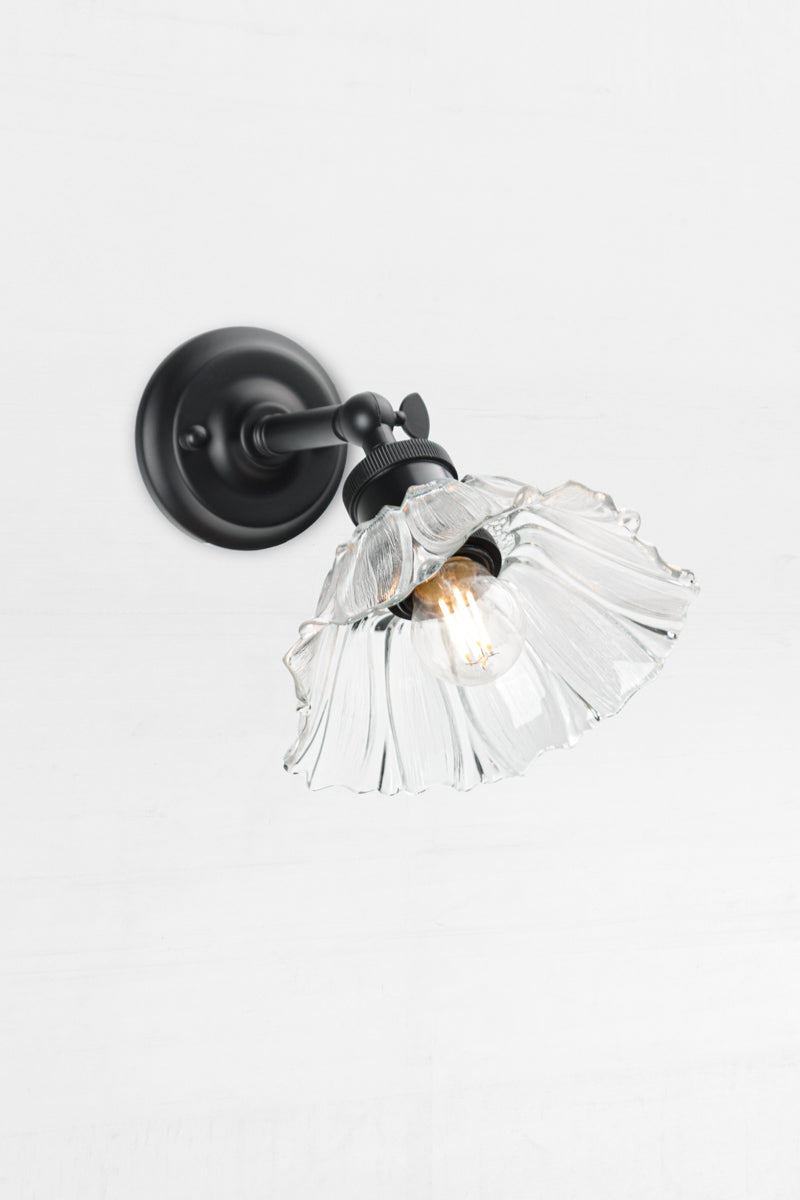 Barfleur glass shade with black wall arm can tilt up