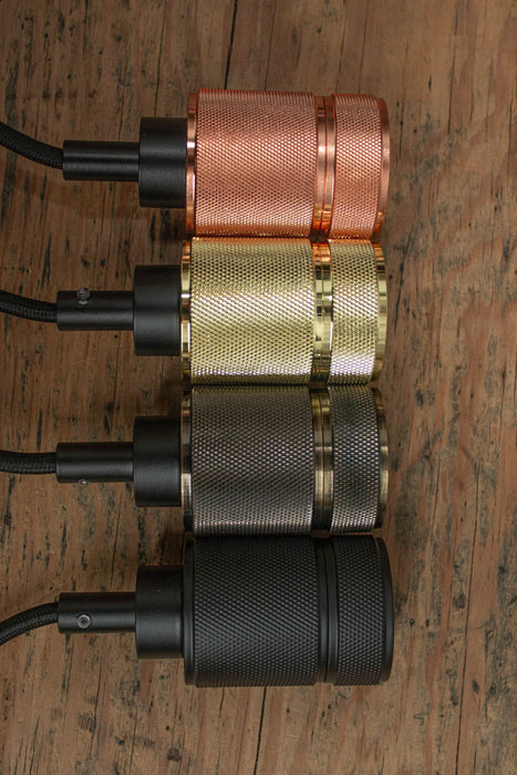 Four colour options of the Knurled Metal Lamp Holder. 