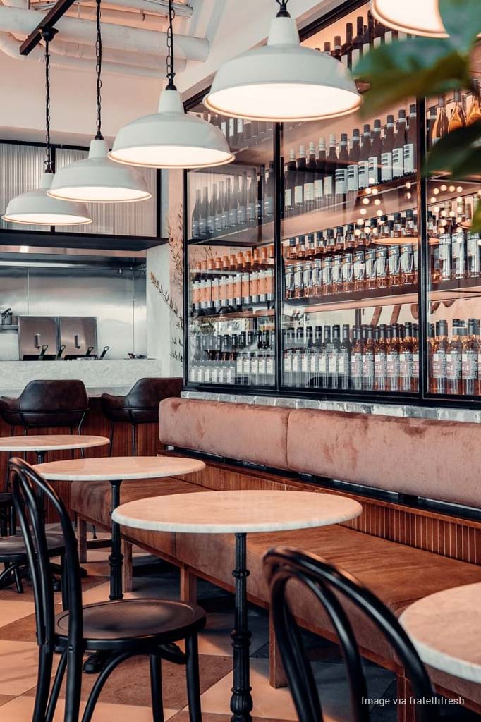 Row of saw tooth chain pendants with white shades in the Fratelli fresh restaurant in Sydney