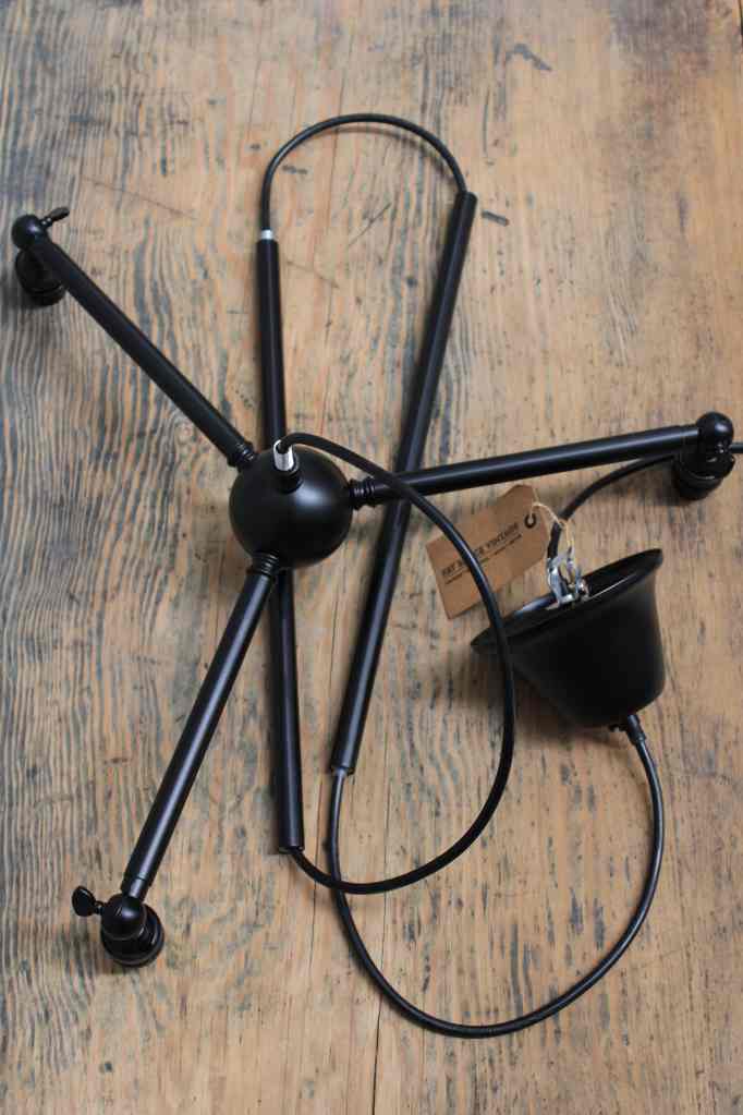 Black straight three arm fixture