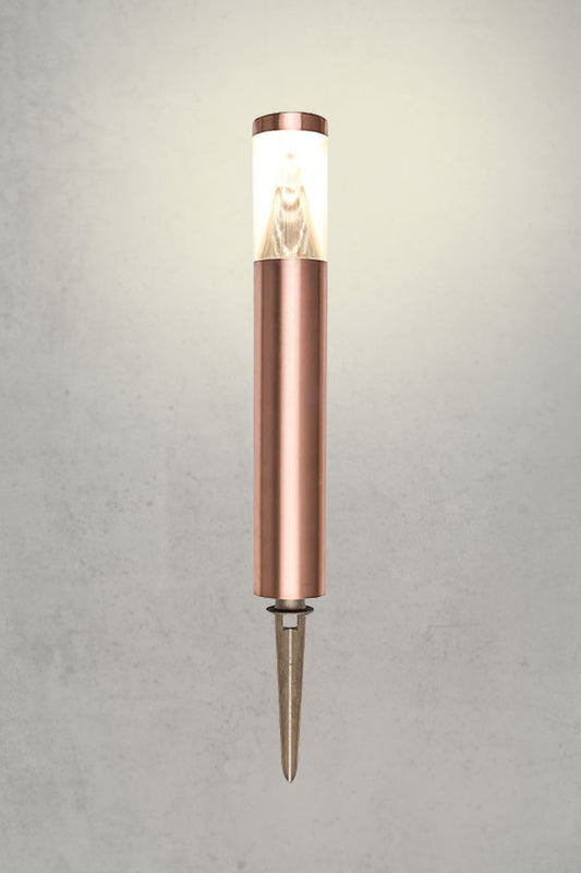 Illuminated images of the Innes garden spike light in copper. 