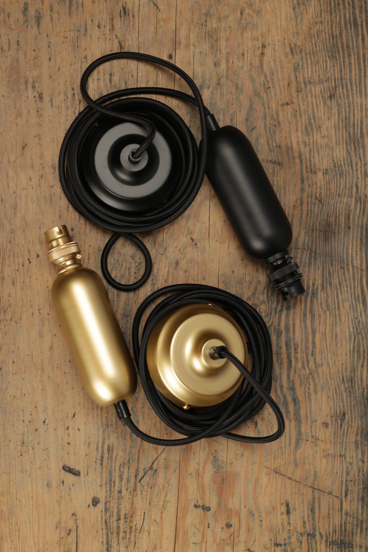 tube cord in black and gold brass