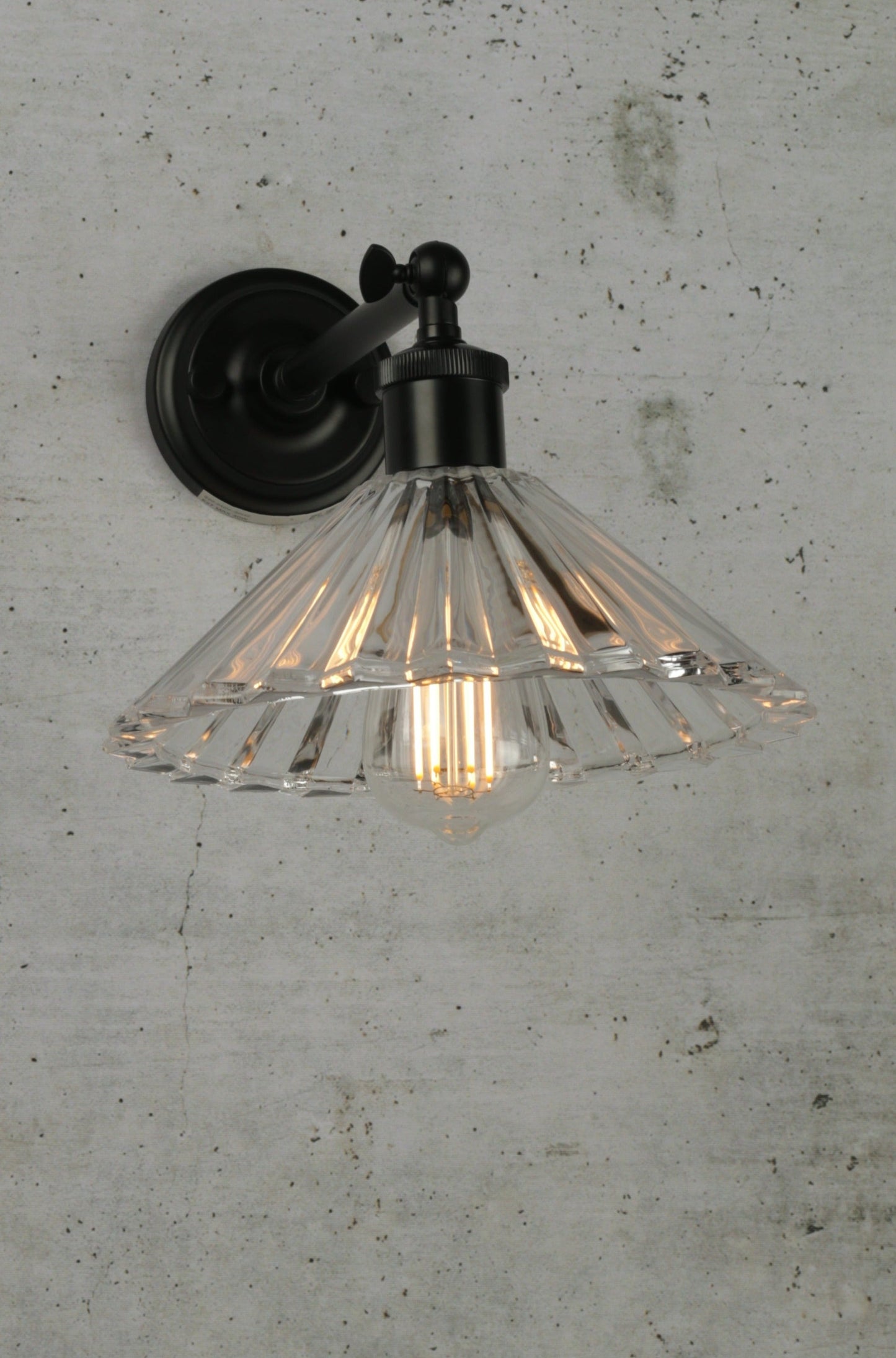 Paris Pleated Glass Wall Light on black arm