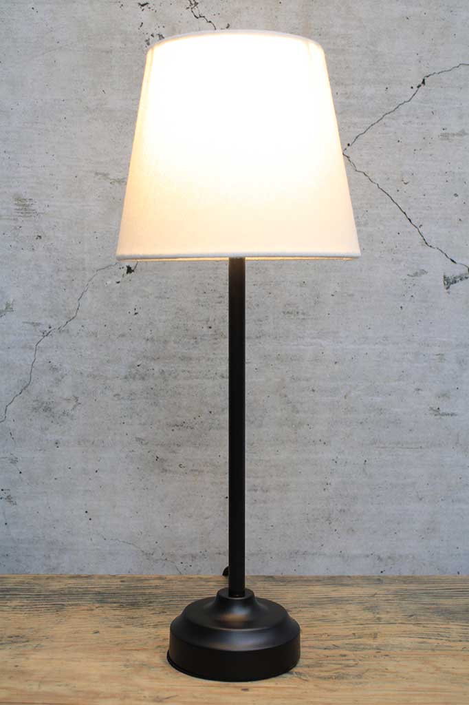 Black table lamp with white fabric shade