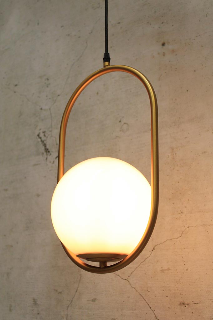 Opal glass pendant light in gold/brass