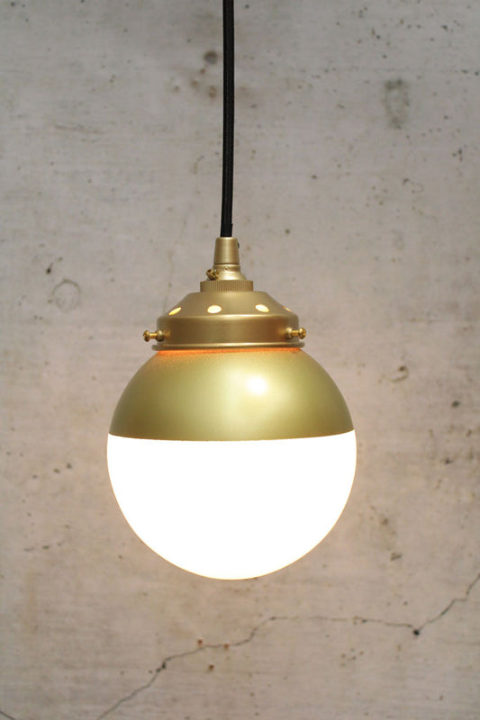 Crown Sphere Glass Pendant Light with a gold gallery, black cord with a gold and opal shade