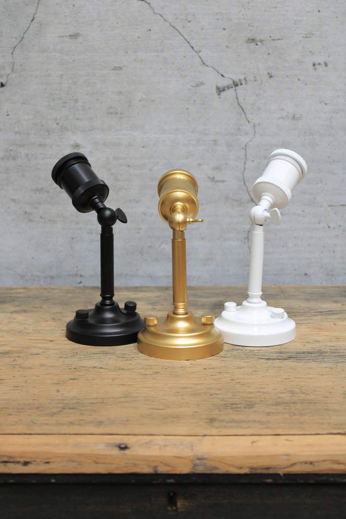 Black, white and gold/brass wall sconces