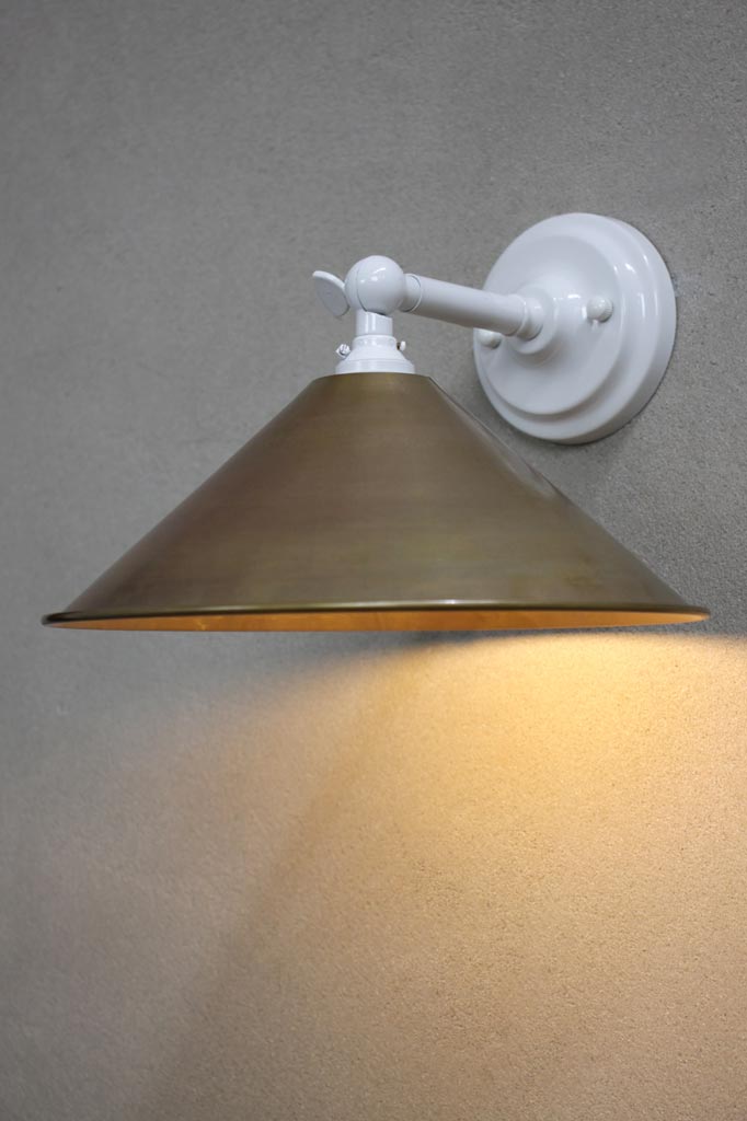 Small brass cone wall light with white arm