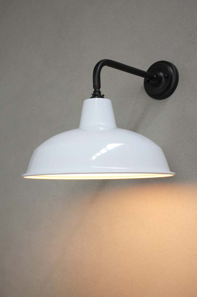 Warehouse shade in white with black wall sconce.