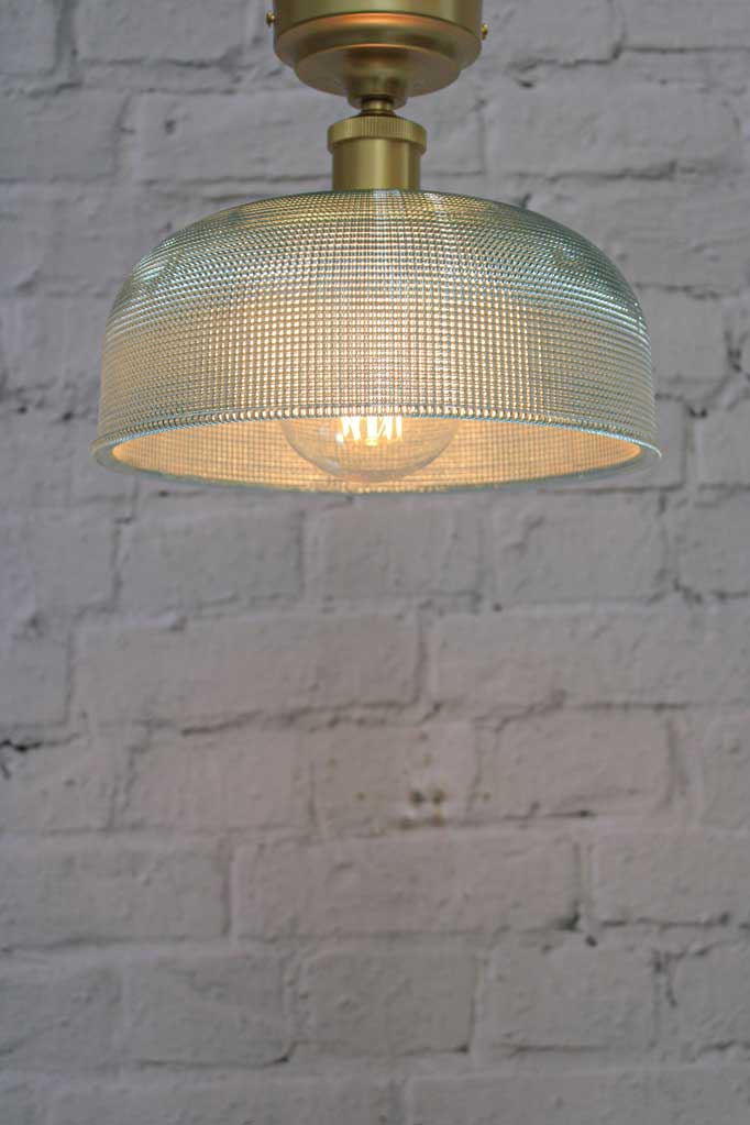 Large blue ceiling light with gold batten holder