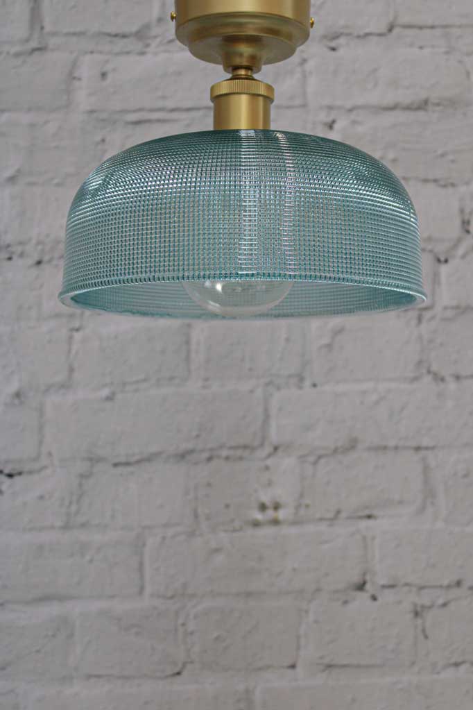 Large blue ceiling light with gold batten holder