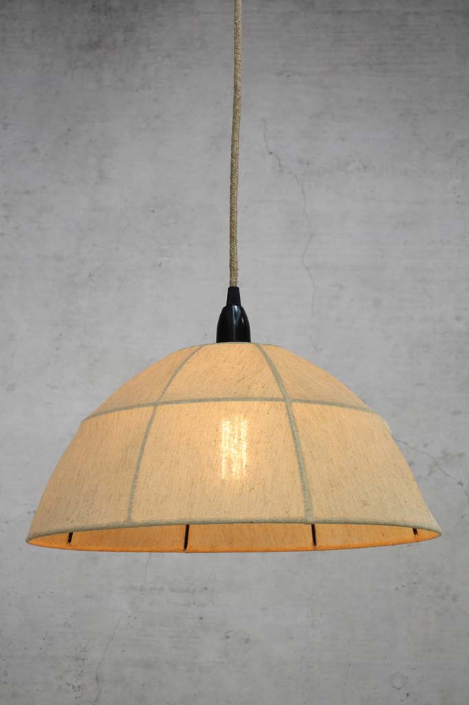 Industrial farmhouse pendant light shade with jut cord.