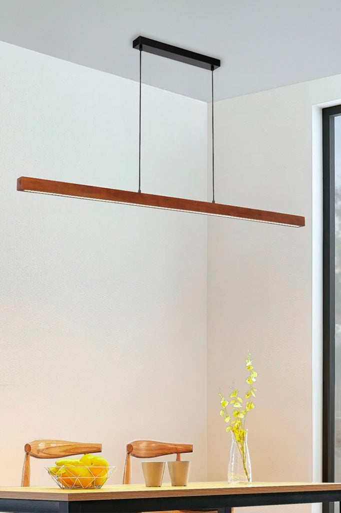 Linear timber light over dining table