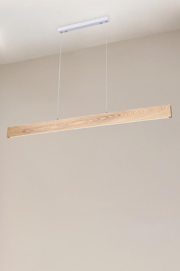 Lancelin wood linear pendant close up with a beige background. 