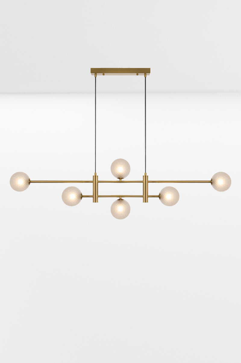 Six light Gold pendant with an art deco vibe and Frost Tear glass ball shades. 