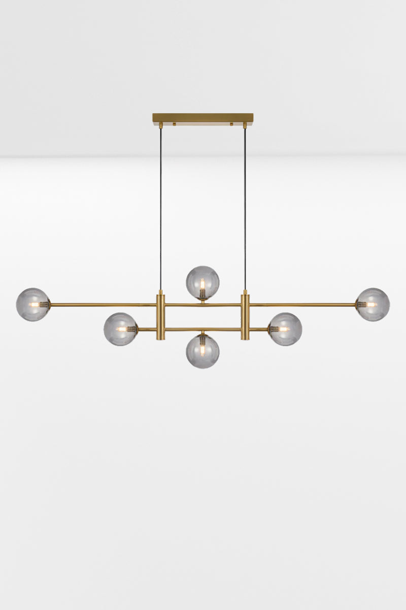 Six light Gold pendant with an art deco vibe and Smoke glass ball shades. 