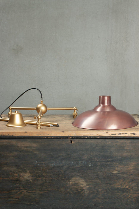 Bullpit shade in Aged Solid Copper with a gold/brass 3 arm fixture