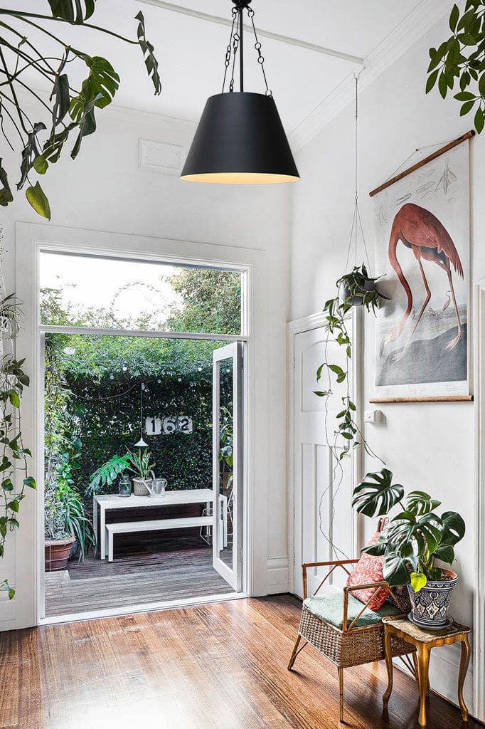 black pendant in hallway