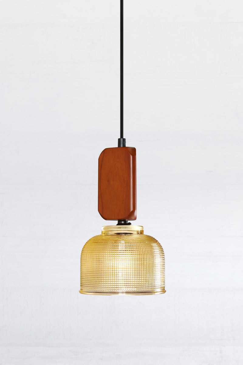 Small amber chapman shade with a woodblock pendant cord. 