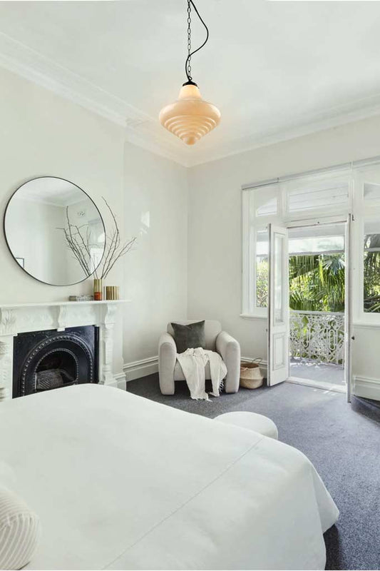 Schoolhouse Pendant Light - Portland with black chain cord in a bedroom 