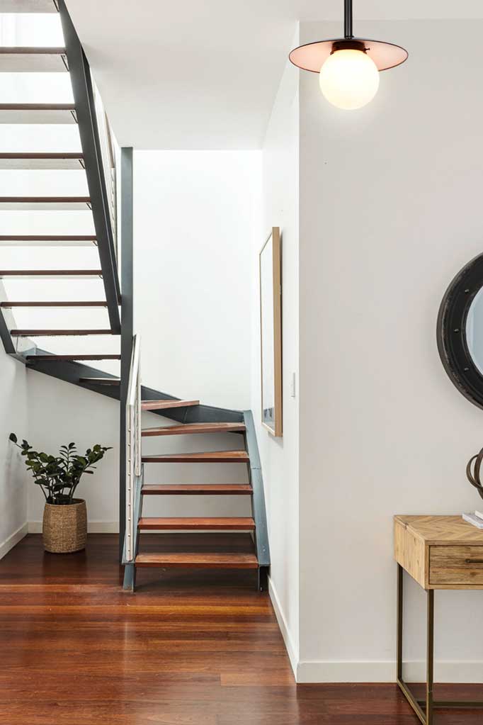 Kentucky Glass Pole Pendant in stairwell