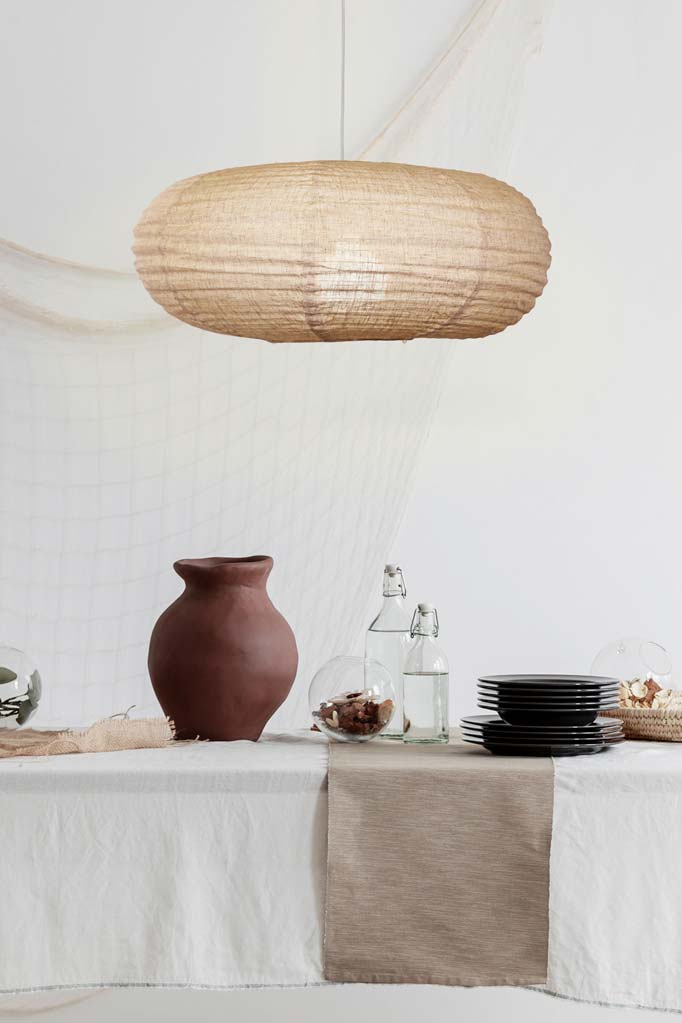 Handmade fabric shade over kitchen tabl