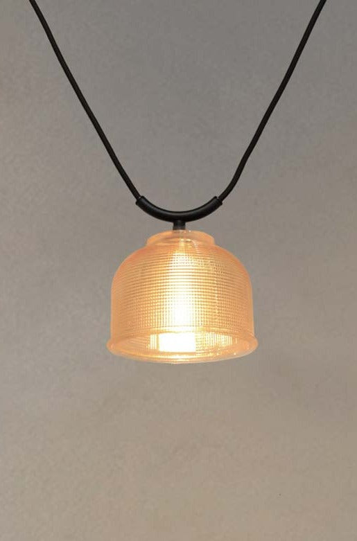 Chapman Glass Trapeze Pendants with amber shade.