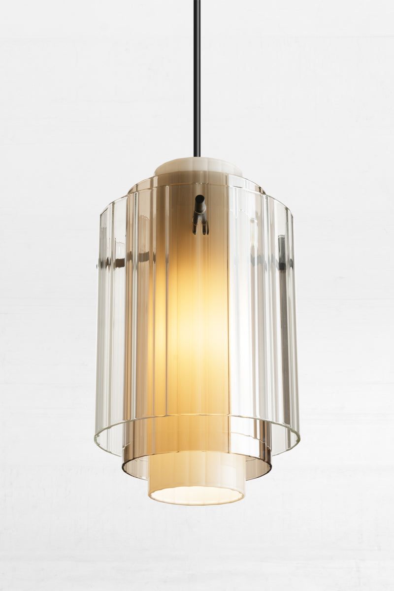 This unique fixture features triple layers of glass help diffuse light creating a softer