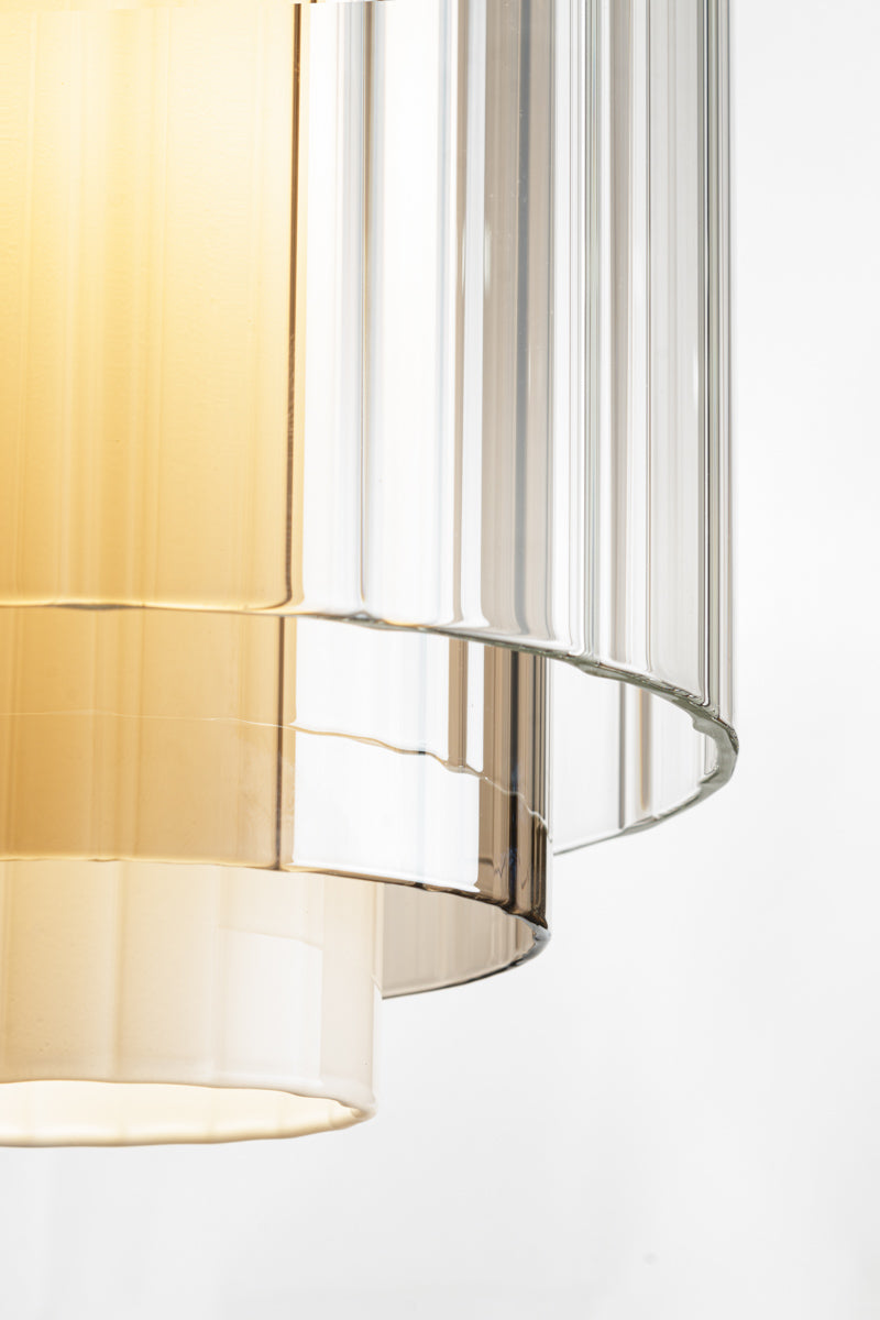 Reeded glass and opal glass in different shaped and sizes make this fixture a true statement piece. 