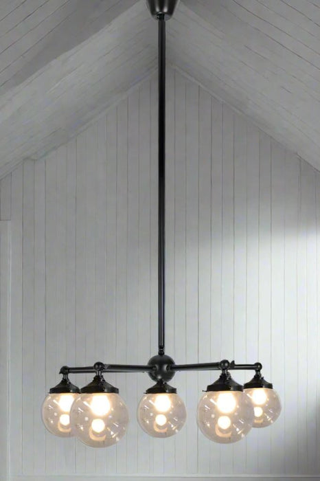 Black 5 straight arm chandelier with small clear shades. 