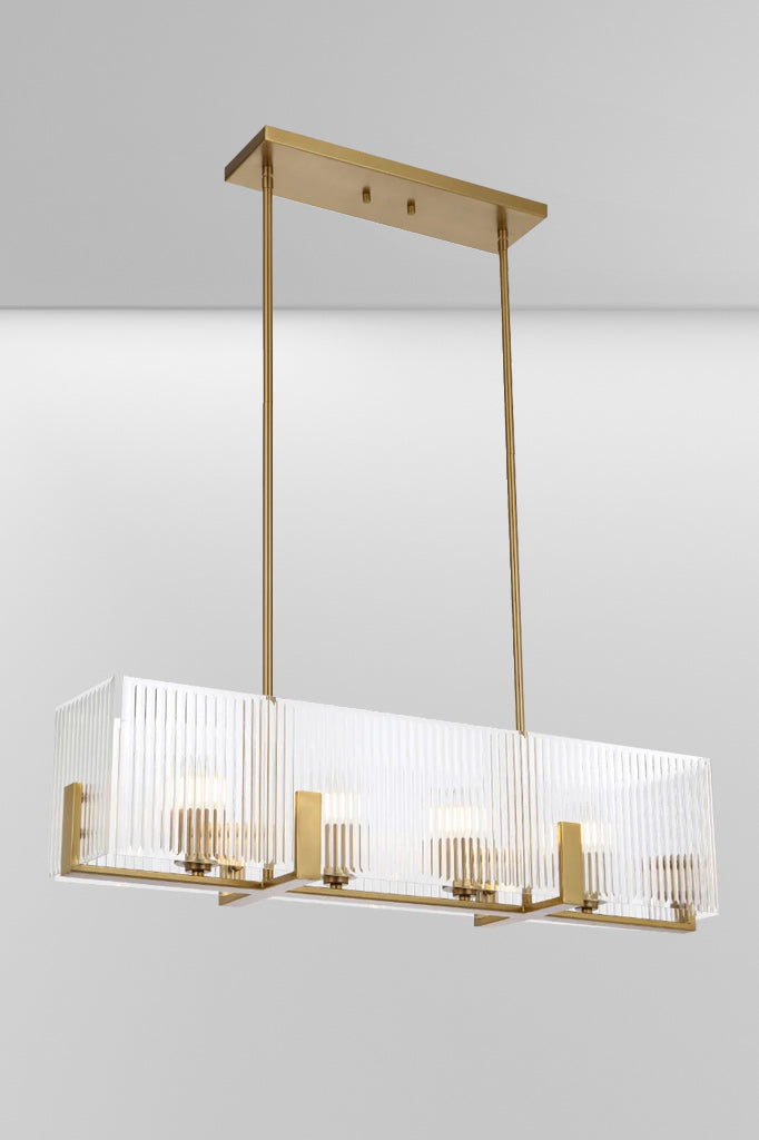 Angled look at the four light Antique Gold pendant rectangular light with reeded glass panels. 