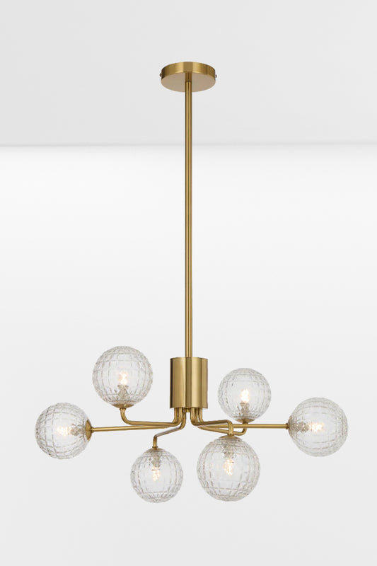 Six arm gold chandelier with clear prism glass ball shades. 