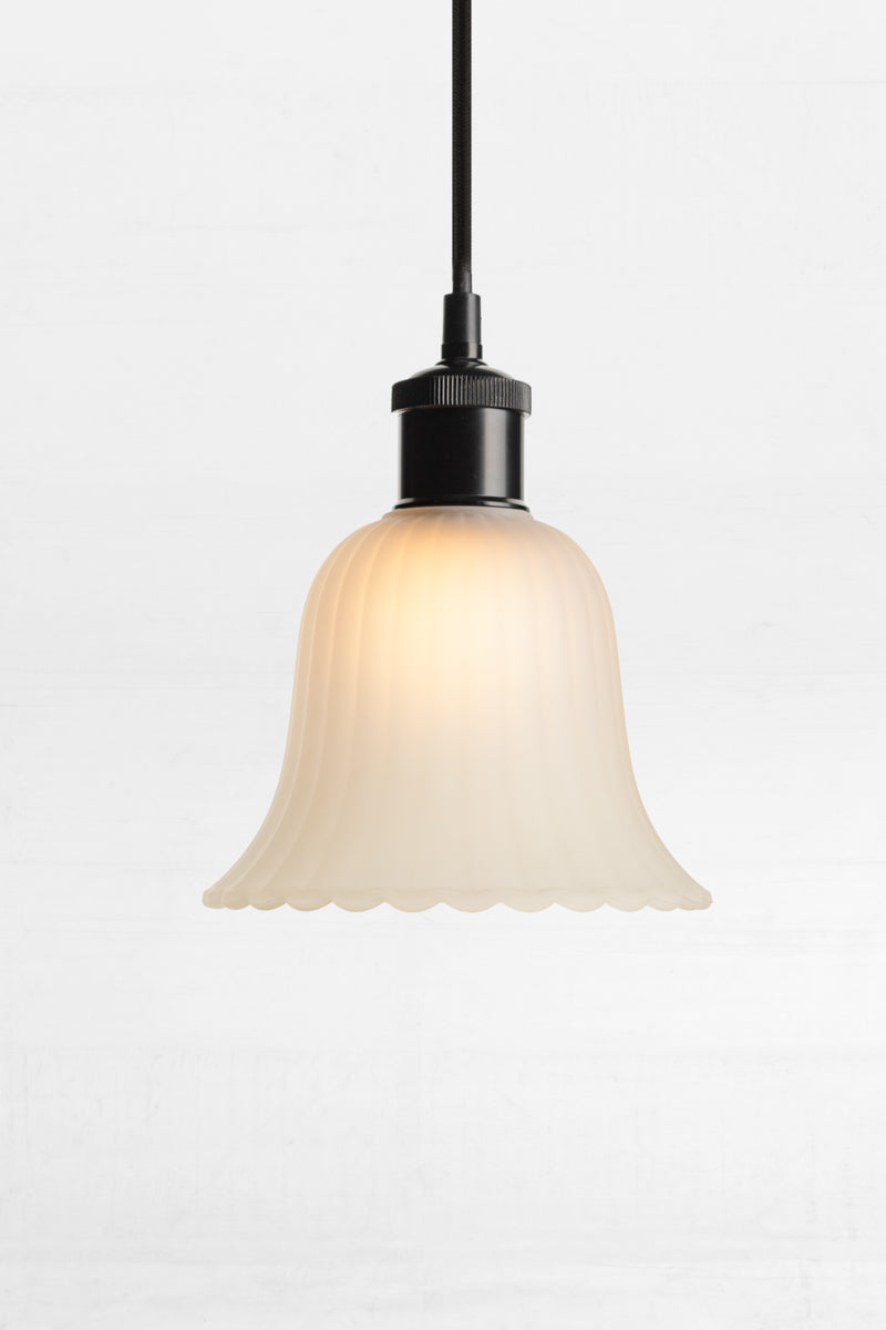 Lille Glass Pendant Light brings understated finesse to any interior.